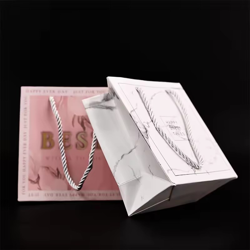 Luxury gift paper bag with your logo gift bag grocery paper with your logo jewelry portable promotional oem competitive price gold paper flyer bagportable promotional oem competitive biodegradable pap